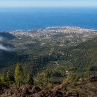 From the slopes of Mount Teide, the view sweeps across the green Orotava Valley to Puerto de la Cruz, stretching along Tenerife’s northern coast and overlooking the Atlantic.