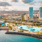 The César Manrique Maritime Park overlooks the ocean with saltwater pools, palm trees and sun terraces, while the Towers of Santa Cruz shape the modern skyline of Tenerife’s capital.