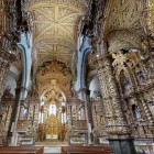 Inside the Church of São Francisco, columns, altars and walls disappear beneath spectacular gilded woodcarving, while the Gothic vaults draw the eye towards the altar.