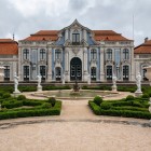 The refined National Palace of Queluz overlooks its geometric gardens, where sculpted hedges, fountains and Rococo decorations evoke the splendour of the Portuguese royal court.