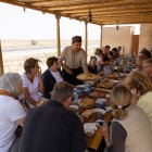 Lunch in a welcoming local restaurant in the Kyzylkum, featuring Uzbek dishes. Indicative photo: the restaurant may vary according to availability.