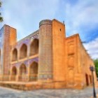 The Nadir Divan-Begi Madrasa, built in the 17th century as a caravanserai, surprises travellers with its mosaic portal and famous simurghs, symbols of ancient Bukhara.