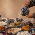 In Bukhara, the tasting experience embraces Uzbek hospitality with aromatic spiced teas, traditional sweets, dried fruit and navat.