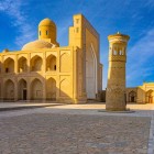 At the heart of the Chor Bakr Necropolis, the grand portal, brick domes and minaret dominate the courtyard, revealing Bukhara’s spiritual architecture.