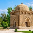 The Ismail Samani Mausoleum, a masterpiece from the 9th–10th centuries, fascinates with geometric patterns in baked brick that change appearance throughout the day.
