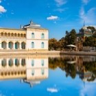 The Sitorai Mokhi Khosa Palace, summer residence of the last emir, blends Eastern elegance with Russian influences, reflected in the gardens of royal Bukhara.