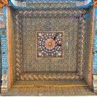 In the Bahauddin Naqshband Mausoleum, carved wooden ceilings painted with stars, geometric patterns and flowers reveal the elegance of traditional Uzbek art.