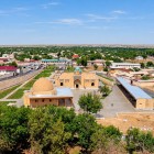 From above, the Chashma Complex rises from the green heart of Nurata: mosques, domes and sacred courtyards reveal the spiritual history of this ancient Uzbek oasis.