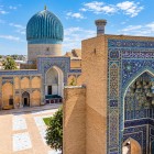 From the courtyard, the famous turquoise ribbed dome comes into view, the symbol of the Gur-e Amir, rising above the mausoleum where Tamerlane and members of the Timurid dynasty rest.