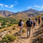 The trail gradually climbs into the Nuratau hills. The village fades behind as the landscape becomes wider, quieter and increasingly dominated by the mountains.