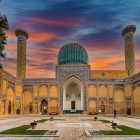 The grand portal introduces the Gur-e Amir, the dynastic mausoleum of the Timurids: glazed tiles, geometric motifs and inscriptions anticipate the complex's rich decoration.