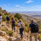 The climb continues towards Korovoultepa. As the trail gains altitude, the horizon widens and the vast plains beyond the Nuratau Mountains begin to appear.