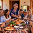 Back at the guesthouse after the walk, the day ends with dinner prepared by the hosts, an authentic experience of Uzbek hospitality and local family life.