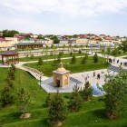 Approaching the site, you encounter the simple brick building housing the long tomb traditionally attributed to the Prophet Daniel, a figure shared by the three monotheistic religions.