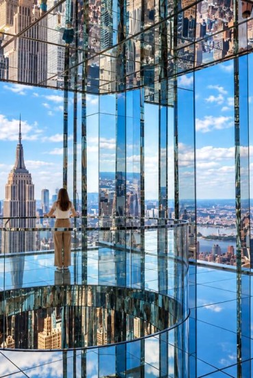 SUMMIT One Vanderbilt observation deck with mirrored surfaces and views of the Manhattan skyline